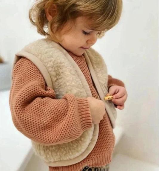 girl wearing sherpa cardigan